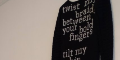 crocheted sweater with poetry